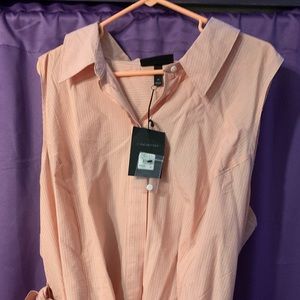 Collared sleeveless button down top